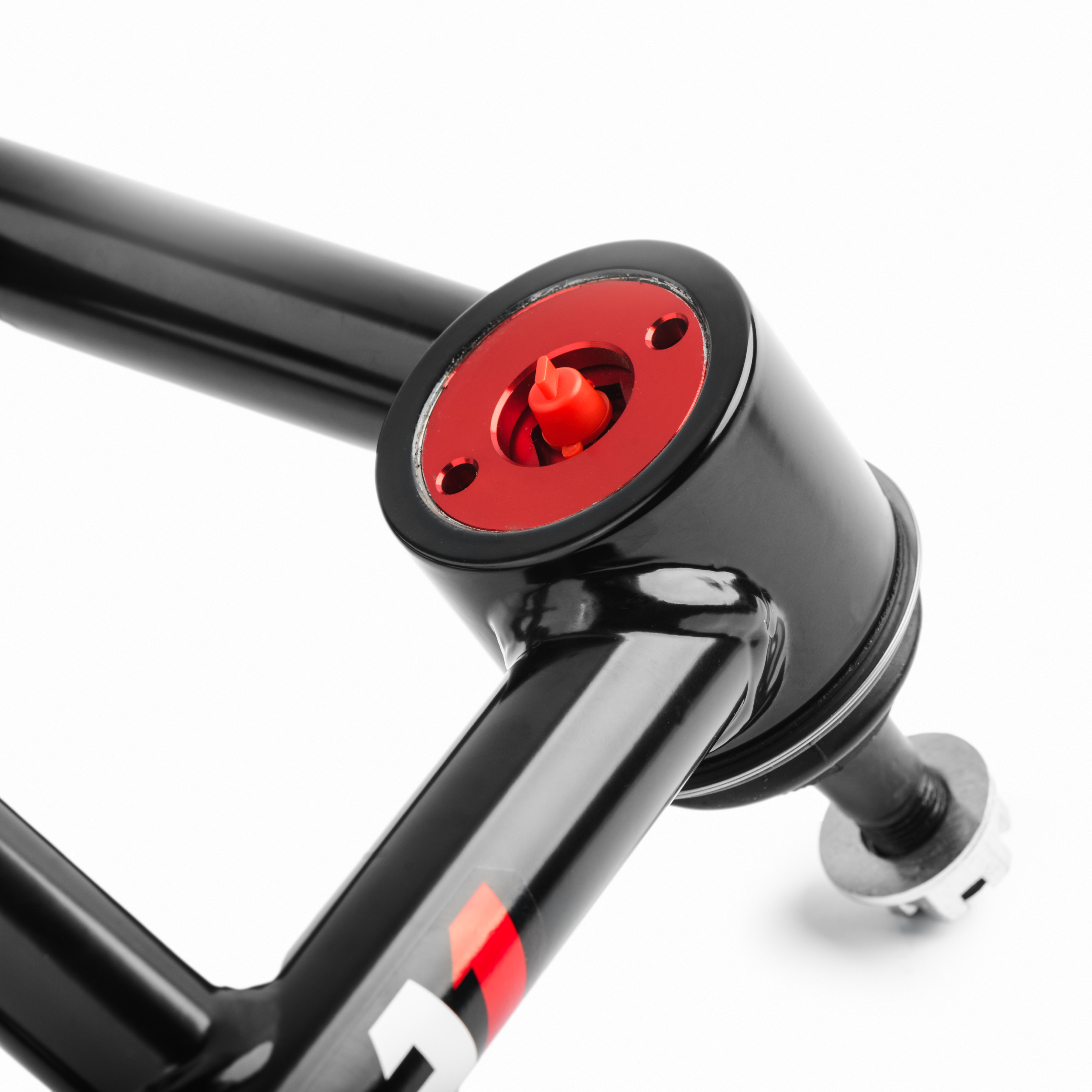 QA1's ball joint housing is integrated into the control arm itself. QA1's ball joint housing is integrated into the control arm itself.